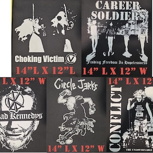 May include: Five black and white fabric patches featuring punk band graphics and text. Each patch measures 14 inches by 12 inches. Designs include Choking Victim, Career Soldiers, Dead Kennedys, Circle Jerks, and Conflict with their respective logos.