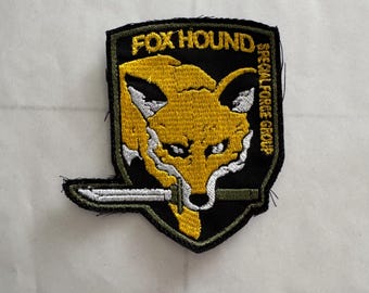 Toppa posteriore FOXHOUND di Metal Gear Solid - Italia