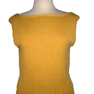 May include: A sleeveless, mustard yellow knitted top with a wide, square neckline.