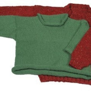 May include: Three knitted sweaters in shades of red and green. The sweaters are made of a textured yarn, with a crew neck and long sleeves. The green sweater is smaller than the red sweaters. The sweaters are likely for cold weather.