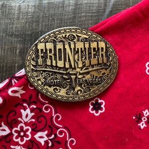 Vintage Frontier Hotel Las Vegas Brass Belt Buckle image 1