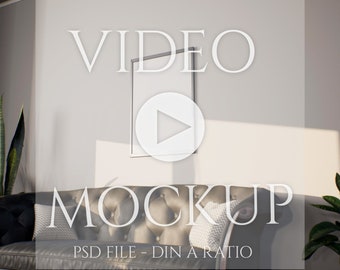 May include: A mockup of a video player on a wall above a gray sofa with pillows. The text "VIDEO MOCKUP" is on the image. The text "PSD FILE - DIN A RATIO" is at the bottom of the image.