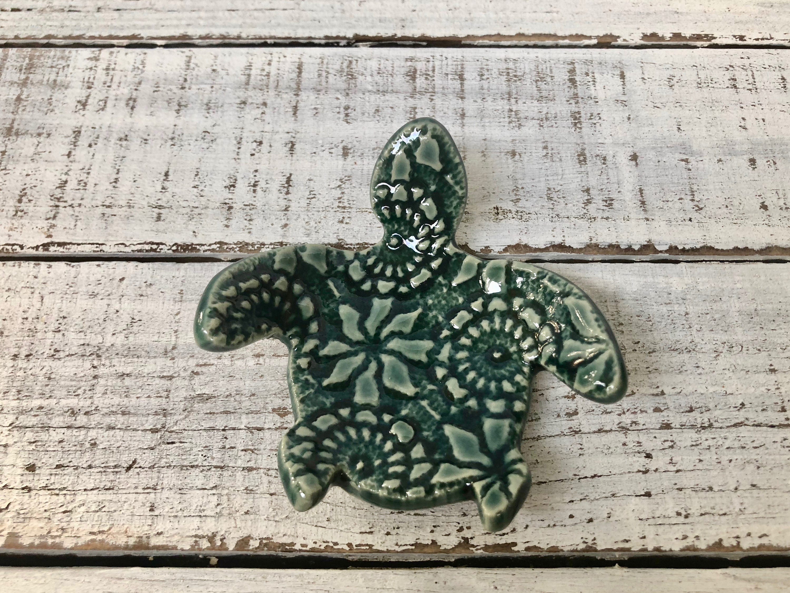 sea turtle spoon rest keeps your stove tidy. Each sea turtle spoon