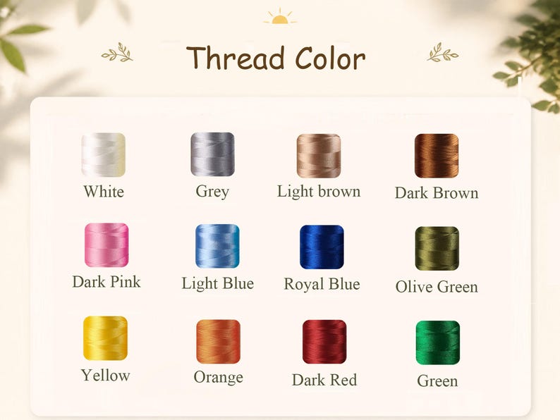 May include: A color chart titled Thread Color displaying twelve spools of embroidery thread in white, grey, light brown, dark brown, dark pink, light blue, royal blue, olive green, yellow, orange, dark red, and green, each labeled with its color name.