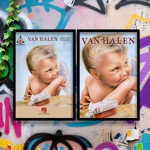 May include: Two framed posters featuring the Van Halen band logo and album art. The artwork depicts a cherubic figure with wings, holding a cigarette pack. The posters are in black frames against a graffiti wall.