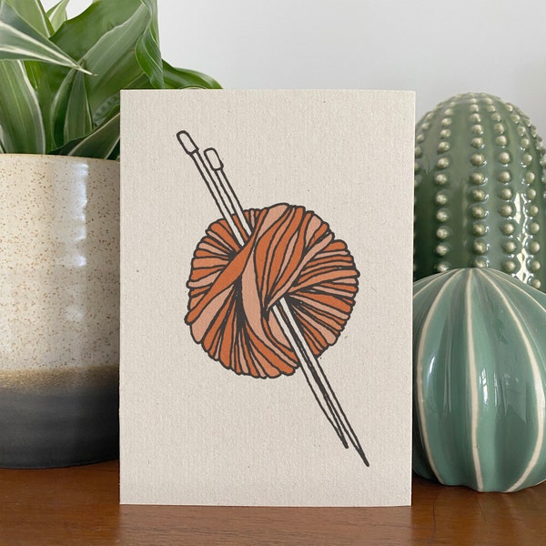 Knitting card, recycled eco friendly ball of yarn and knitting needles illustration.