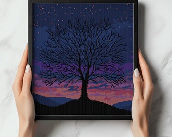 Árvore solitária ao anoitecer. Desenho de paisagem para ponto de cruz