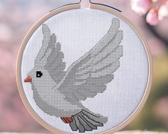 Voo suave da pomba. Desenho fácil para ponto de cruz