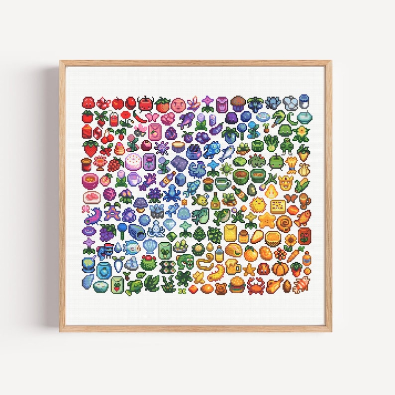 May include: A framed cross-stitch artwork featuring a vibrant array of pixelated food and objects arranged in a rainbow gradient. The artwork includes fruits, vegetables, and other items, all rendered in a colorful, detailed pattern.