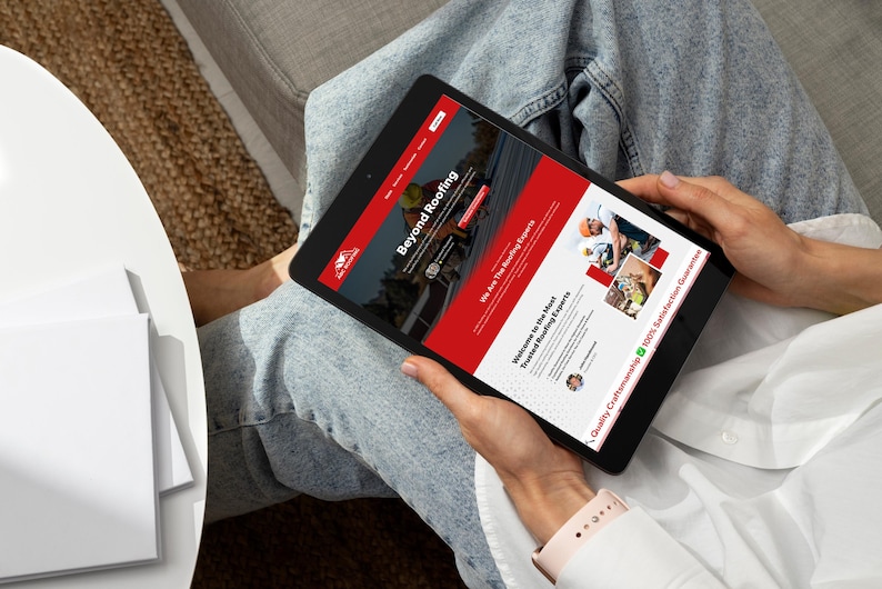 Tablet view of the ABC Roofing website template designed on Wix Studio, being used by a customer in a casual setting. This mockup highlights the mobile-friendly, touch-optimized interface ideal for clients browsing on the go. The design retains its visual appeal and user experience across devices, ensuring roofing companies can attract and engage prospects wherever they are.