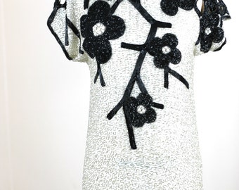Vintage jurk met uitgesneden mouwen met kralen, zwart-witte cocktailjurk met bloemen kralen, jaren 80 glamour formele jurk (m.h.a.)