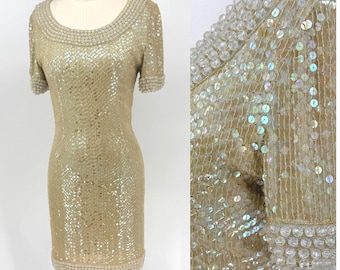 Vintage Oleg Cassini cocktailjurk met zwarte strik, kralen en pailletten, champagnekleurige avondjurk, feestjurk, jurk voor de moeder van de bruid (maat 4)