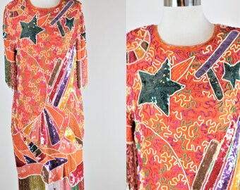 Maat M//Funky flapper jaren 80 glamour jurk met kralen en lovertjes//Vintage oranje jurk met sterren en franje pailletten