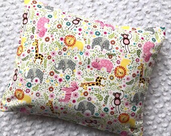 The Perfect Toddler Pillow . Jungle Animals on White Flannel  . Sew Cinnamon . Lions Elephants Zebra Hippo Giraffe . Flat Lightweight Travel