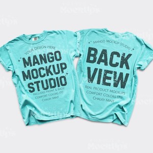 May include: Two turquoise t-shirts. The front displays "MANGO MOCKUP STUDIO", the back says "BACK VIEW". The shirts are made of Comfort Colors 1717 material in Chalky Mint.