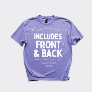 May include: A violet short-sleeve t-shirt featuring white text that reads YOUR DESIGN HERE INCLUDES FRONT & BACK MANGO MOCKUP STUDIO GILDAN 5000 VIOLET, accented by small four-pointed star graphics printed on the front of the garment.