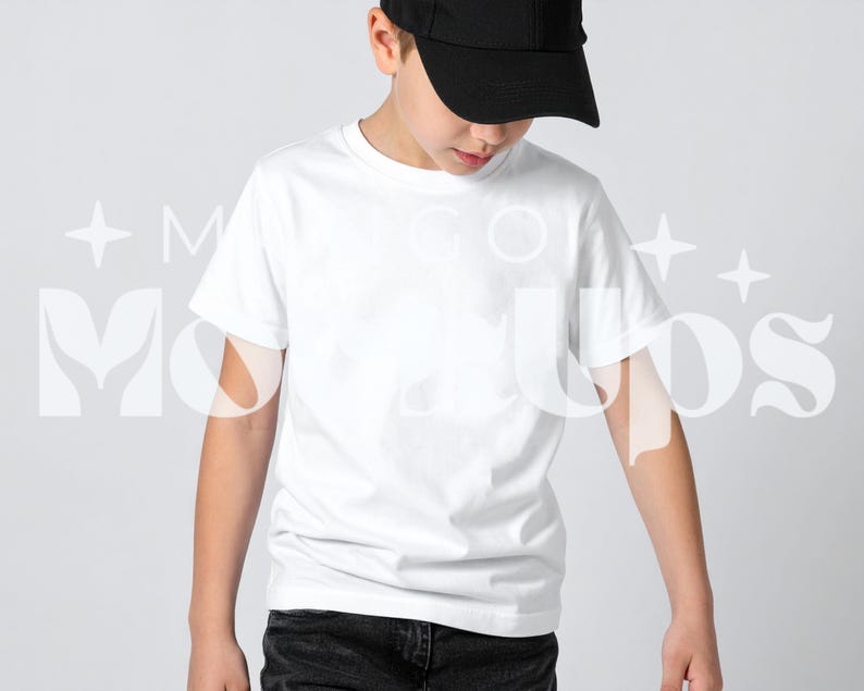 May include: A white crew neck t-shirt and black baseball cap. The t-shirt is plain and has short sleeves. The cap is black and has a curved brim. The person is wearing black jeans.
