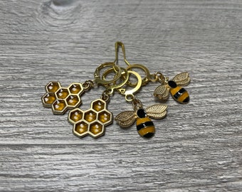 Ensemble de quatre marqueurs de point abeille et miel