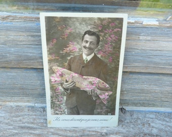 Antique 1900/1910s postcard  French real photo recolored  Man with fish