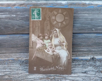 Antique 1900s old French  Christmas scenas postcard recolored photography with cherubs