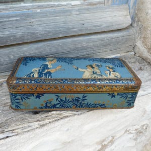 Scatola di latta vintage francese degli anni '20/'30, stile Art Déco, raffigurante madre e figli.