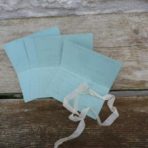 Conjunto antiguo de 4 cartas de amor francesas antiguas de 1902/1903 escritas a mano, en papel azul, con cinta de seda