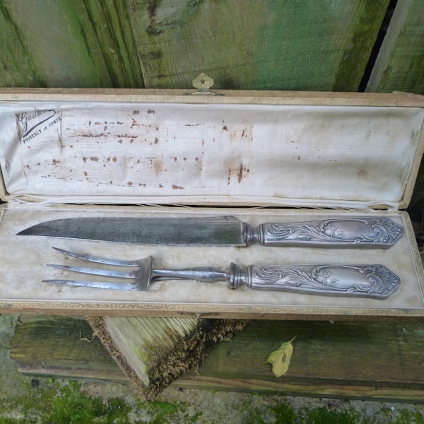 Ancien service à gigot en argent fourchette et couteau