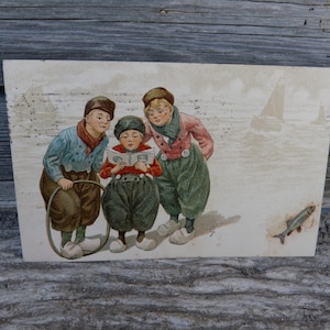 Carte postale 1900  Enfants Paques carte en relief
