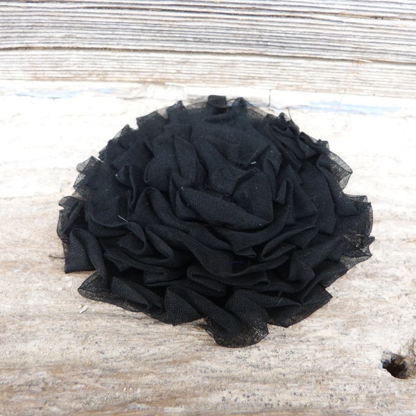 Fleur en tissu noir pour chapeau ou autre