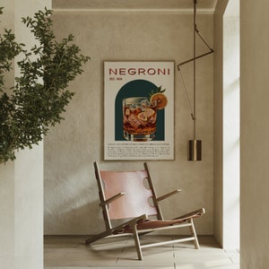 Minimalist space with concrete walls, a chair, and a retro vintage poster;  a classic Negroni cocktail in a glass with ice and an orange slice, the style is retro. The poster details the drinks history and ingredients; modern, architectural vibe.