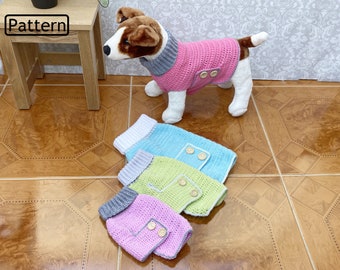 May include: Four crocheted dog sweaters in pink, green, blue, and white with grey trim. The sweaters have buttons and are laid out on a brown tiled floor. The word "Pattern" is visible in the top left corner of the image.
