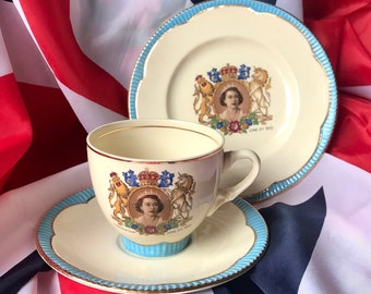 Clarice Cliff Queen Elizabeth 11 Coronation 1953 Tea Set Trio - Commemorative Ware - Newport Pottery Cream Ware, Cup, Saucer, Plate.Blue Rim