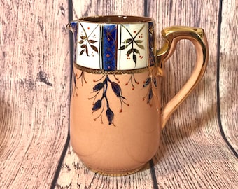 Vintage1950s  English Redware Milk Jug, Salmon Pink, Hand Painted Pattern with Gilding.