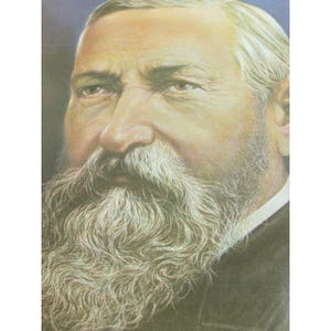 May include: A detailed portrait of an older man with a long, flowing white beard and mustache. The man has fair skin, and his hair is also white. He is wearing a dark suit with a white collared shirt. The portrait is a close-up, focusing on the man's face.