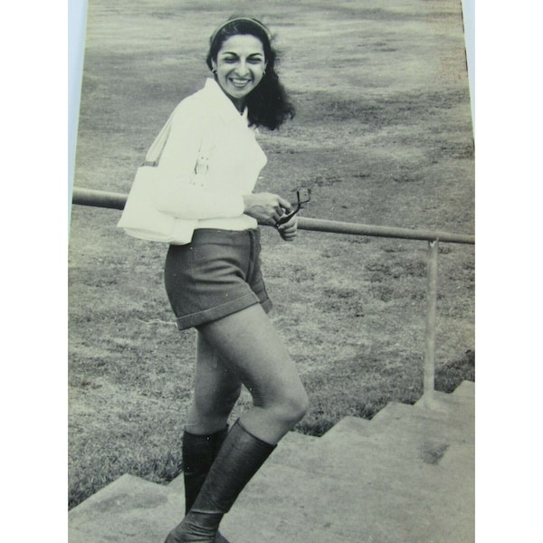 Photograph Young Woman Smiling Hot Pants Steps Candid 1970s Photo 31872