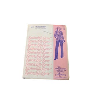 May include: A vintage sewing pattern for a one-button blazer, featuring a pink and white design with the text "Stretch & Sew" repeated. The pattern includes an illustration of a blazer and pants outfit.