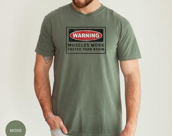 Camiseta con mensaje de advertencia: Los músculos trabajan más rápido que el cerebro. Camiseta de gimnasio, camiseta de entrenamiento, camiseta divertida de fitness, camiseta con mensaje sobre músculos y cerebro, camiseta para hacer ejercicio.