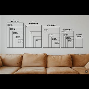 May include: A chart showing different aspect ratios for prints, including 2:3, 4:5, 3:4, and 11:14. The chart includes measurements in inches and centimeters for each ratio. The chart is displayed on a wall behind a brown couch.