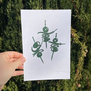 Three Gildas linocut print