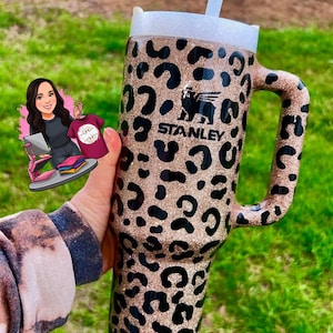 May include: A set of three ceramic mugs with a speckled, matte finish. The mugs are in shades of cream, light gray, and dark gray. Each mug has a simple, minimalist design, perfect for coffee or tea.