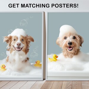 May include: Two framed posters featuring dogs in bathtubs with bubbles and rubber duckies. The left poster shows a brown and white dog, and the right poster shows a tan dog. The text "GET MATCHING POSTERS!" is at the top.