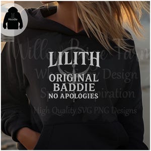 May include: Black hoodie with the text "LILITH ORIGINAL BADDIE NO APOLOGIES" in white. The hoodie has a drawstring hood and a front pocket. The design is centered on the chest.