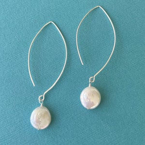 Long coin pearl earrings