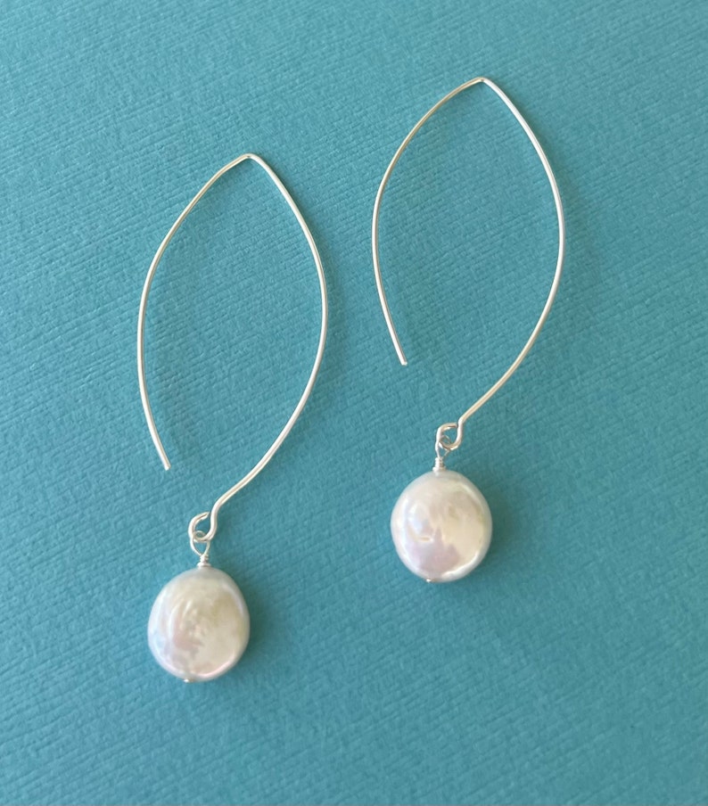 Long coin pearl earrings