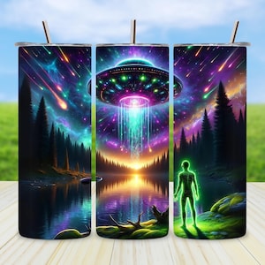 May include: Three stainless steel tumblers with a colorful design of a UFO flying over a forest and a lake. The design features a green, blue, and purple color scheme with a starry night sky.