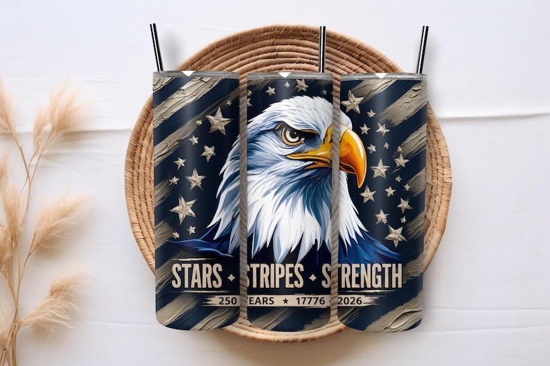 May include: Three stainless steel tumblers with black straws, featuring a patriotic design. The design includes an eagle, stars, and stripes, with the words "Stars, Stripes, Strength" and the numbers 250, 17776, and 2026.