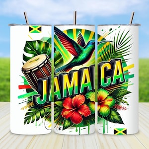 May include: Three white insulated tumblers with a vibrant Jamaica-themed design. The design includes a hummingbird, hibiscus flowers, a drum, and the word "JAMAICA" in bold, 3D lettering. The tumblers have silver straws and lids.
