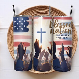 May include: Three stainless steel tumblers with black straws. Each tumbler features a patriotic design with the American flag, a cross, and the words "Blessed Nation - 250 Years - 1776-2026". The design includes raised hands.