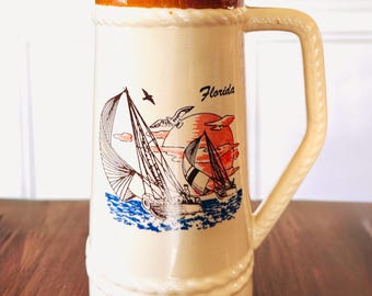 Large vintage Florida souvenir stein — sailboat motif
