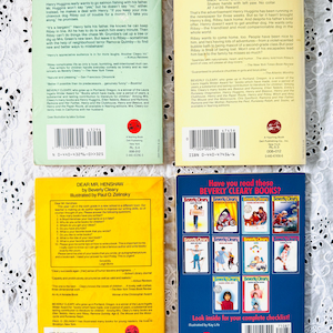 May include: Four paperback books by Beverly Cleary arranged in a grid. The top left is light green, the top right is yellow, the bottom left is yellow, and the bottom right is blue with a grid of ten small book cover illustrations and text.
